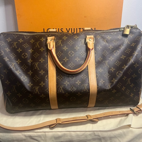 KEEPALL 45 LOUIS VUITTON
DUFFLE TRAVEL WEEKENDER BAG
CROSSBODY DUFFLE BAG/BOX - Picture 3 of 16